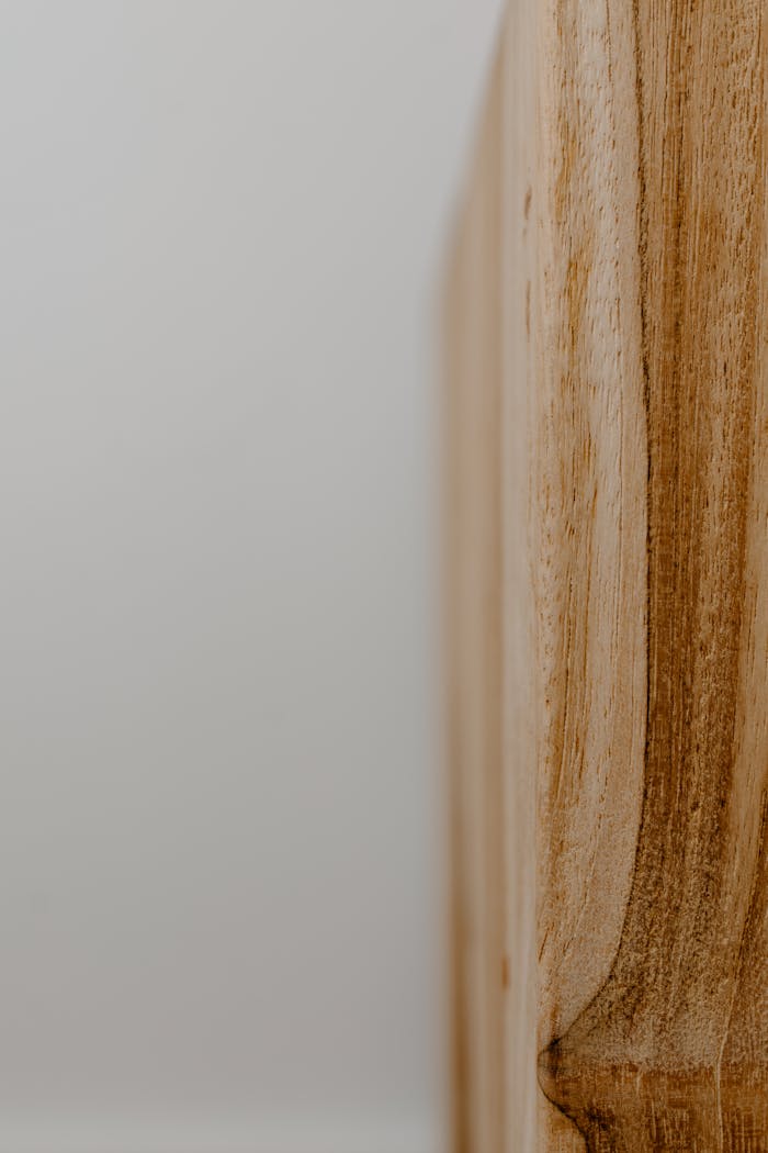 Crafting Captivating Headlines: Your awesome post title goes here Close-up view of a smooth wooden surface capturing minimalist aesthetics in neutral tones.